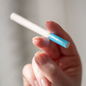 Menthol flavored Menthol Cigarette stick in hand by Wild Hemp